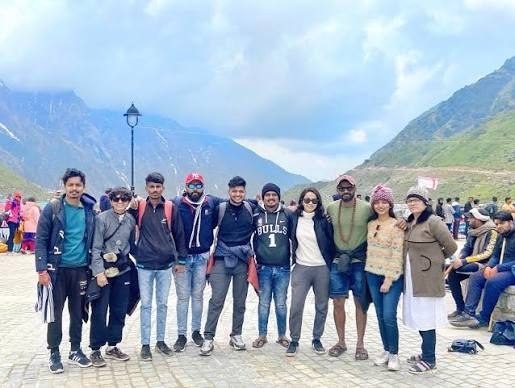 Pilgrims near Kedarnath temple in the clouds